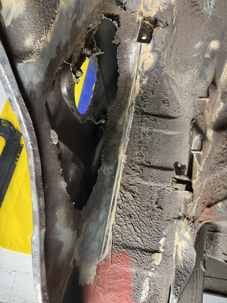 Giant hole in panel around fuel filler neck